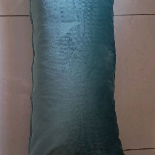 Sofa pillow like new with velvety texture and fringes