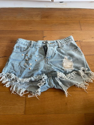 Shorts with fringes used, light blue rock style, size S