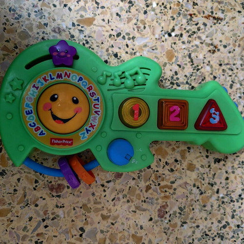 Fisher Price musical guitar used with English songs