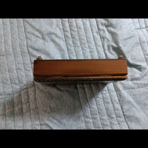 Vintage wooden box used with carved patterns