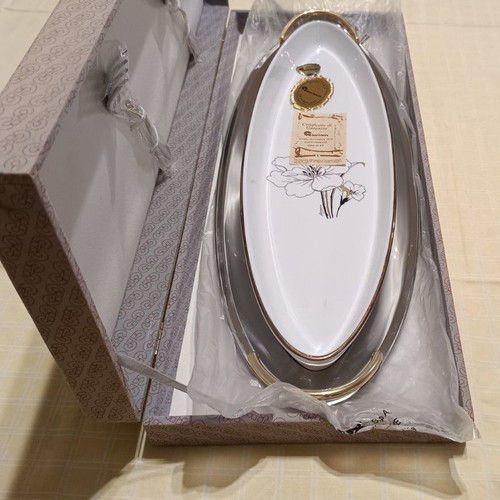 Giorinox serving platter set used, inox and porcelain