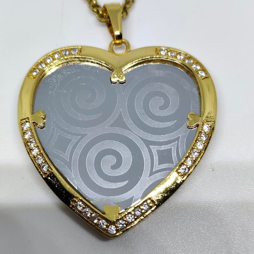 Heart Pendant Necklace with Embossed Spiral Designs, like new