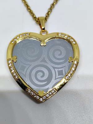 Heart Pendant Necklace with Embossed Spiral Designs, like new