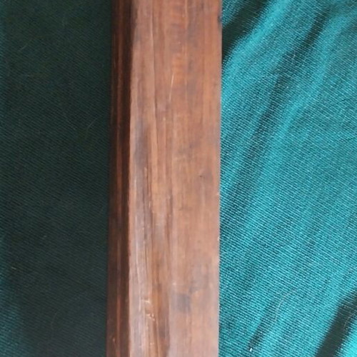 Large wooden loom shuttle used with metal tips