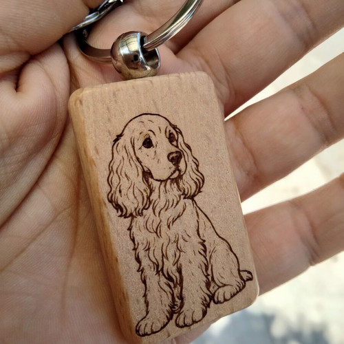Wooden handmade keychain with dog