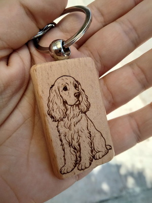 Wooden handmade keychain with dog