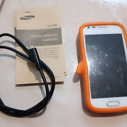 Samsung Galaxy Trend Plus GT-S7580 white used with charger and case