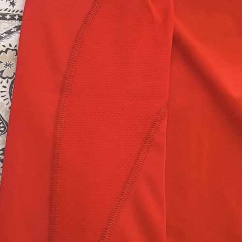 Puma men's technical sports t-shirt size M, like new, red with reflective details