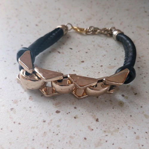 Bracelet black with gold details like new