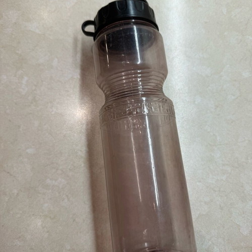 Plastic thermos used, spacious, with broken lid