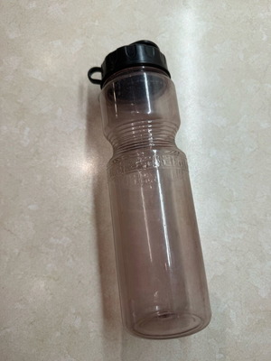 Plastic thermos used, spacious, with broken lid