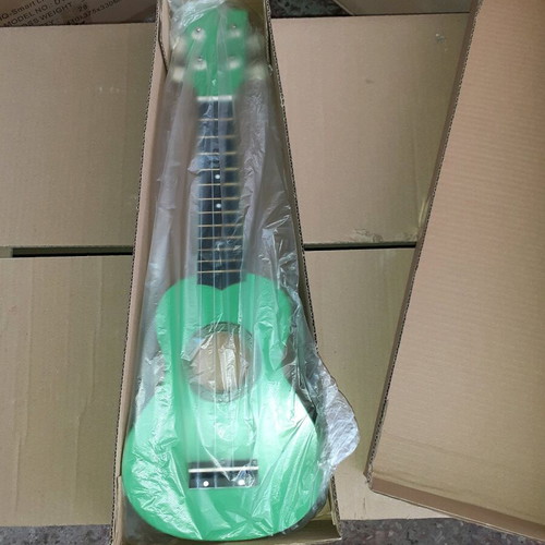 Ukulele new small elegant light green