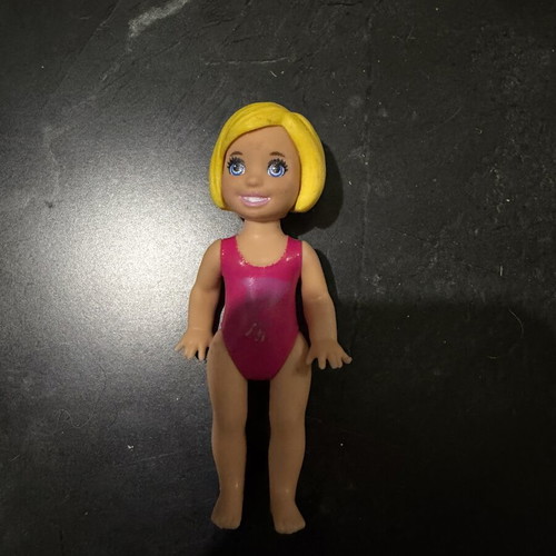 Barbie small doll used