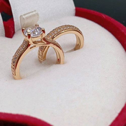 Set of solitaire ring and wedding band plated new with zircon
