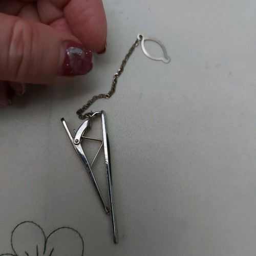Tie clip used, with chain, white