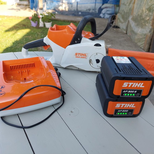 Stihl Battery Chainsaw with Two 300s Batteries and Charger like new