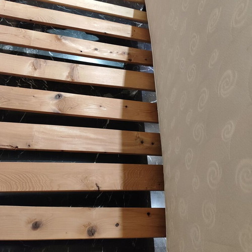 Solid wood single bed with clean mattress