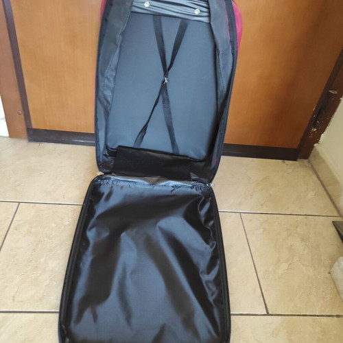 Red fabric travel suitcase trolley carry-on