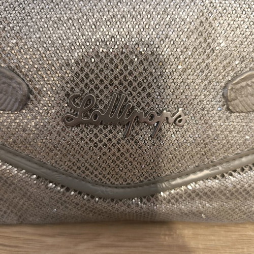 Lollipops bag silver color with decorative wings, like new