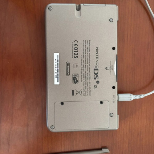 Nintendo Dsi XL like new with Nintendogs card, charger, and stylus