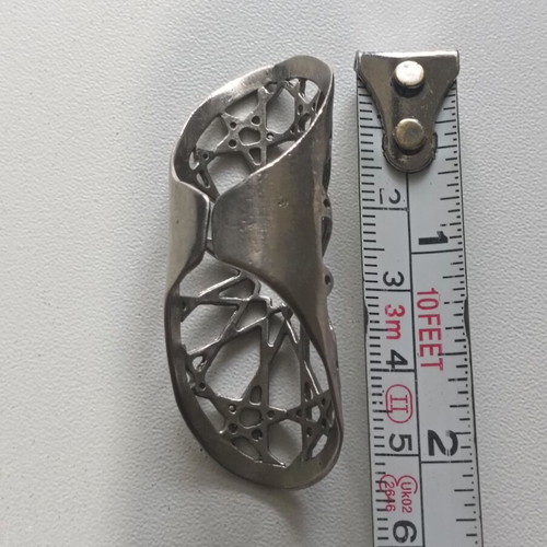 Long ring with adjustable opening like new