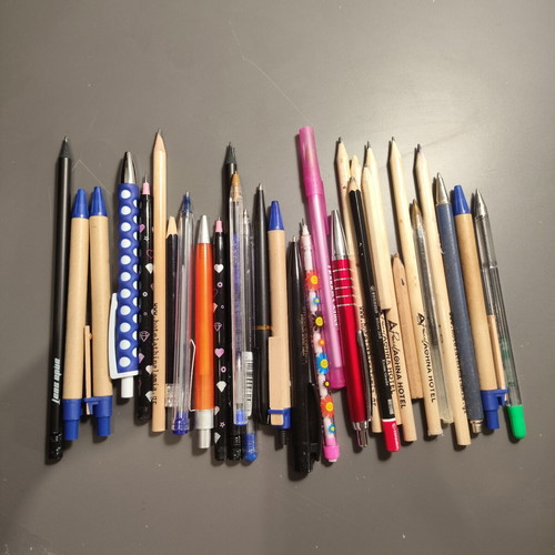 Set of pens and pencils used, some promotional