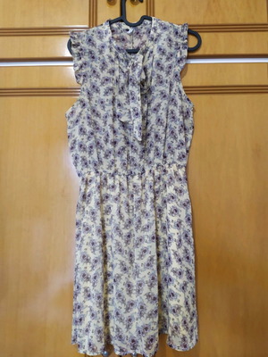 Stardivarius dress used, yellow with floral patterns