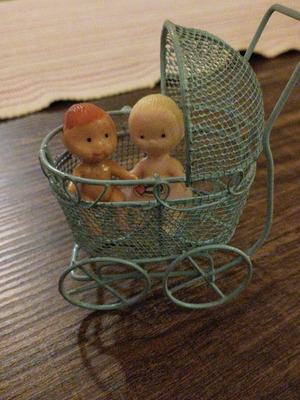 Vintage stroller with babies used