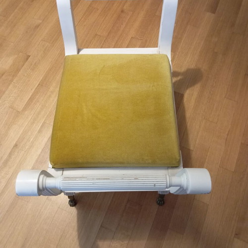 Stool used, missing two legs