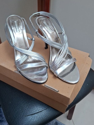 Silver high-heeled sandals used, size 38