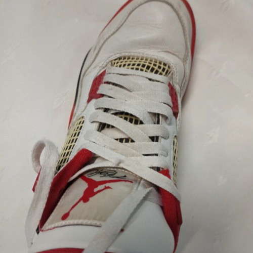 Jordan 4 Fire Red sneakers used, size 41, visible wear