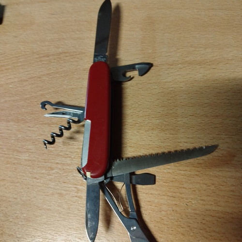 Leatherman Sidekick, Victorinox Swiss, and Opinel No6 knives like new