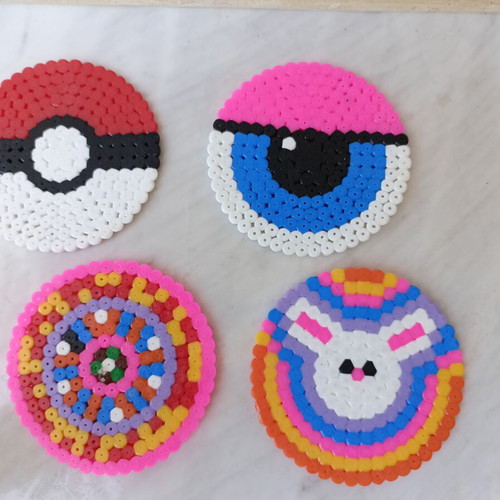 Set of 4 handmade fuse-bead coasters with colorful pixel designs