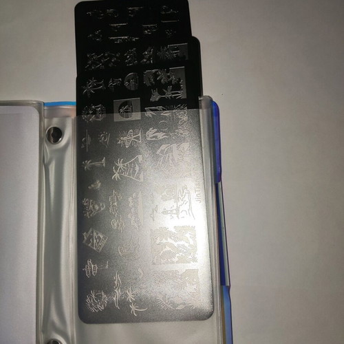 Nail stamping plates like new with storage book