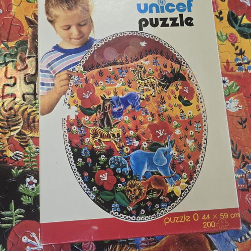 Unicef Red Delirium Puzzle like new, rare collector's item