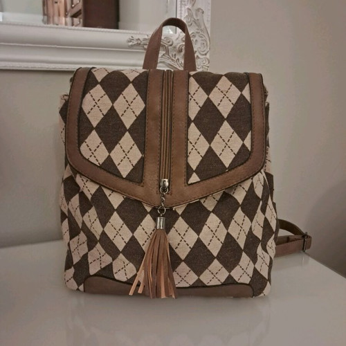 Backpack bag new in brown color unused