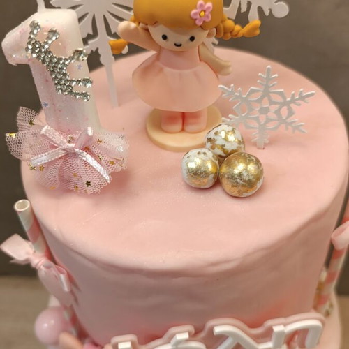 Decorative two-tier birthday cake new, made of fondant
