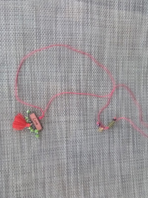 Handmade red pendant with adjustable cord