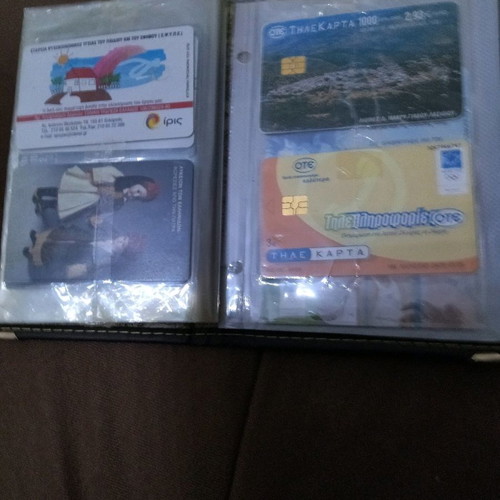 Collectible phone cards used with album