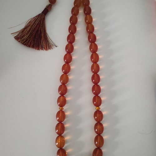 Mastic komboloi with orange shades, 33 beads