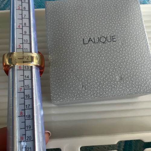 Lalique crystal rings like new, classic amber and clear