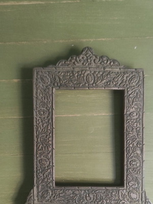 Vintage brass frame used with ornate border