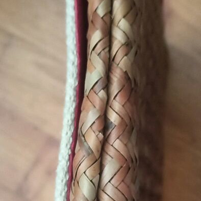 Oysho straw handbag used with boho pom pom design