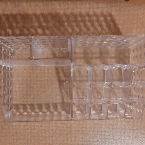 Cosmetic organizer used, transparent
