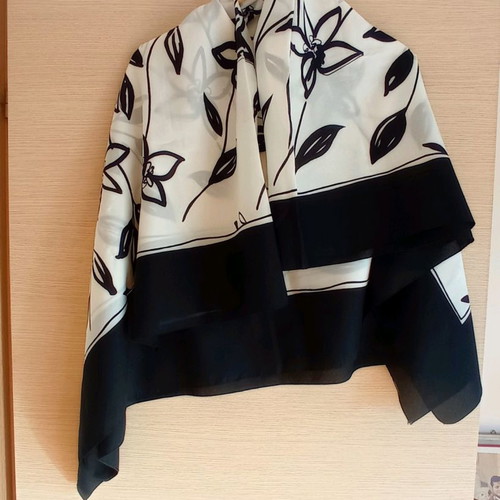 Large scarf used with floral pattern in black and white