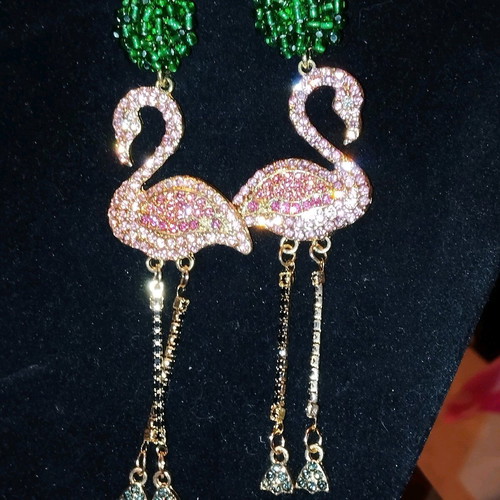 Flamingo stud earrings like new, impressive