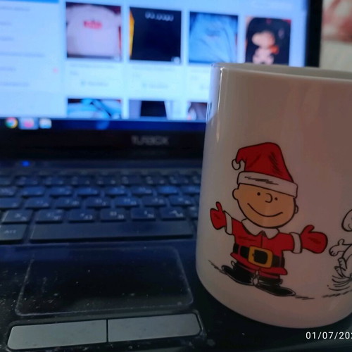 Butlers Snoopy mug with Christmas designs like new