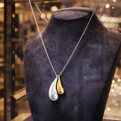 Handmade stainless steel necklace with teardrop pendants 2 and 5 new