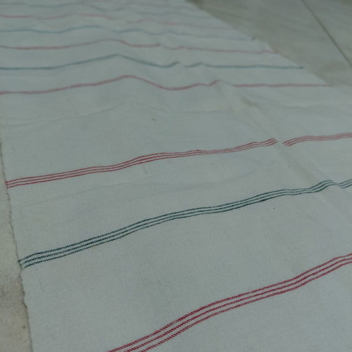 Traditional cotton fabric on loom new, white with colorful stripes