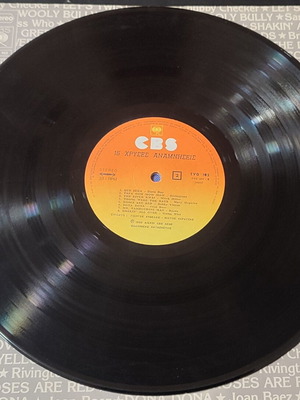16 Golden Memories vinyl record used with scratches